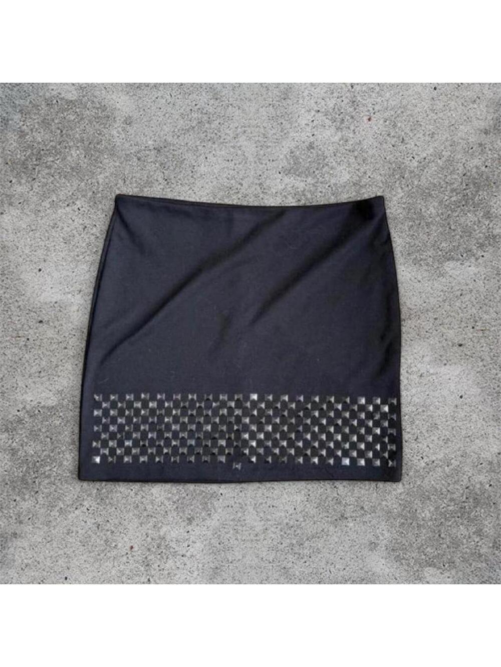 black mini skirt with studs